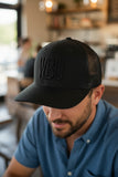 Black Trucker Hat with Puff WBU